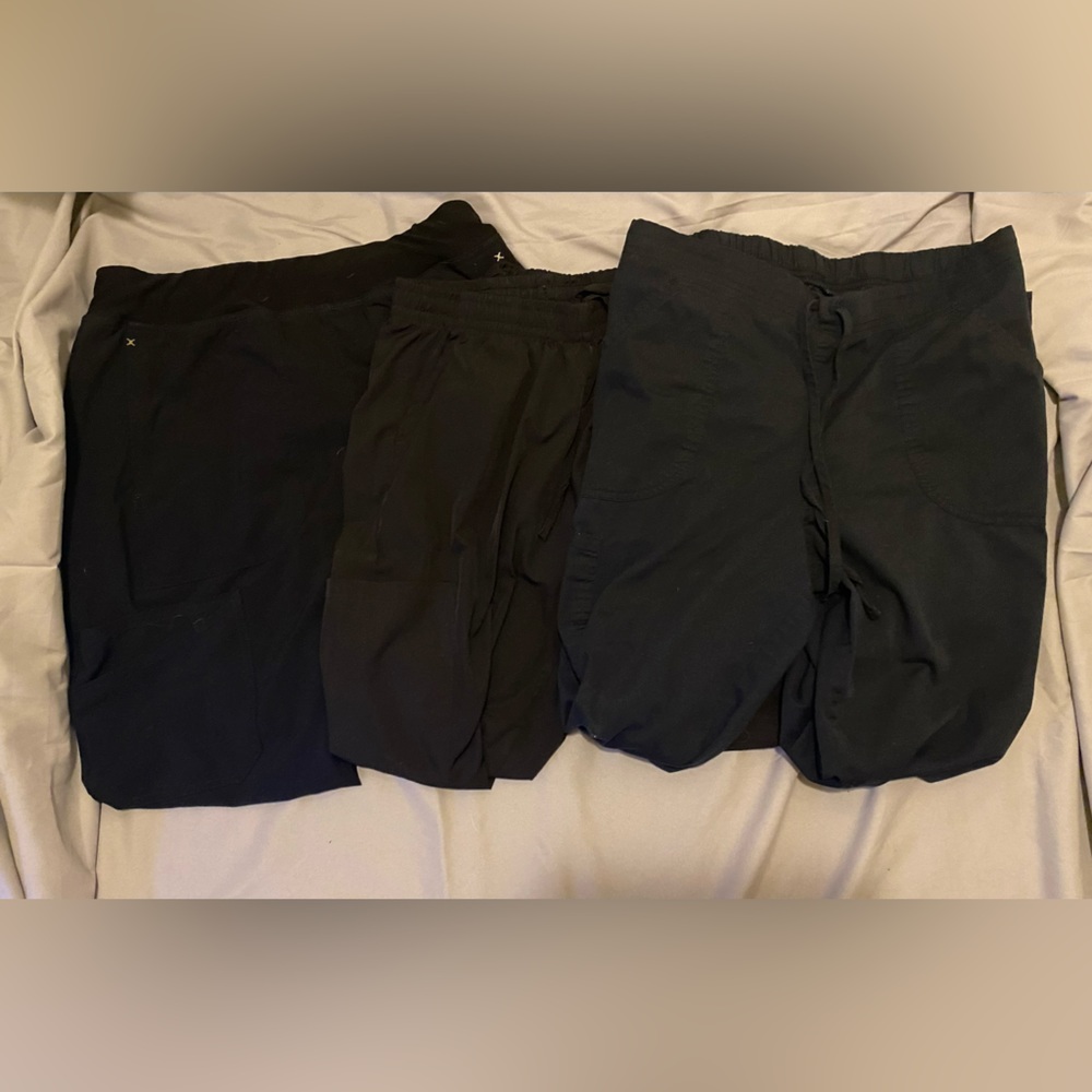 3 pairs of scrub pants- two size smalls, one size medium
